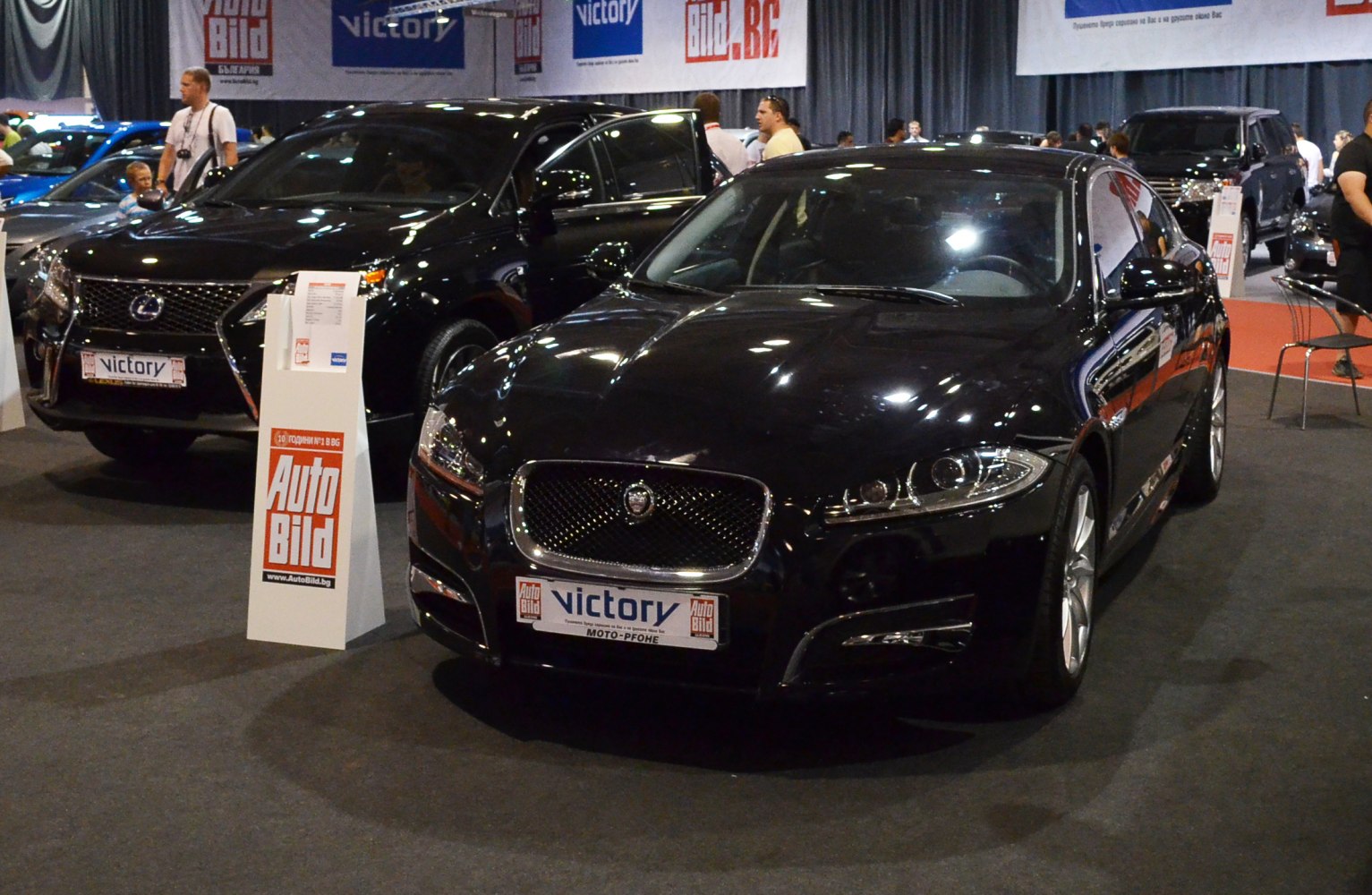Luxury sedan front grille and dual headlights in black finish
