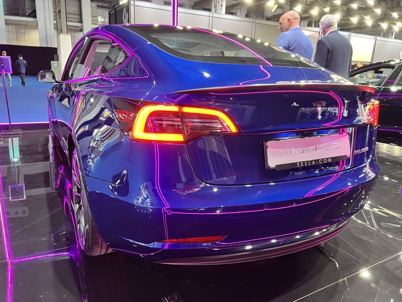 Rear view with LED taillights and sleek blue paint