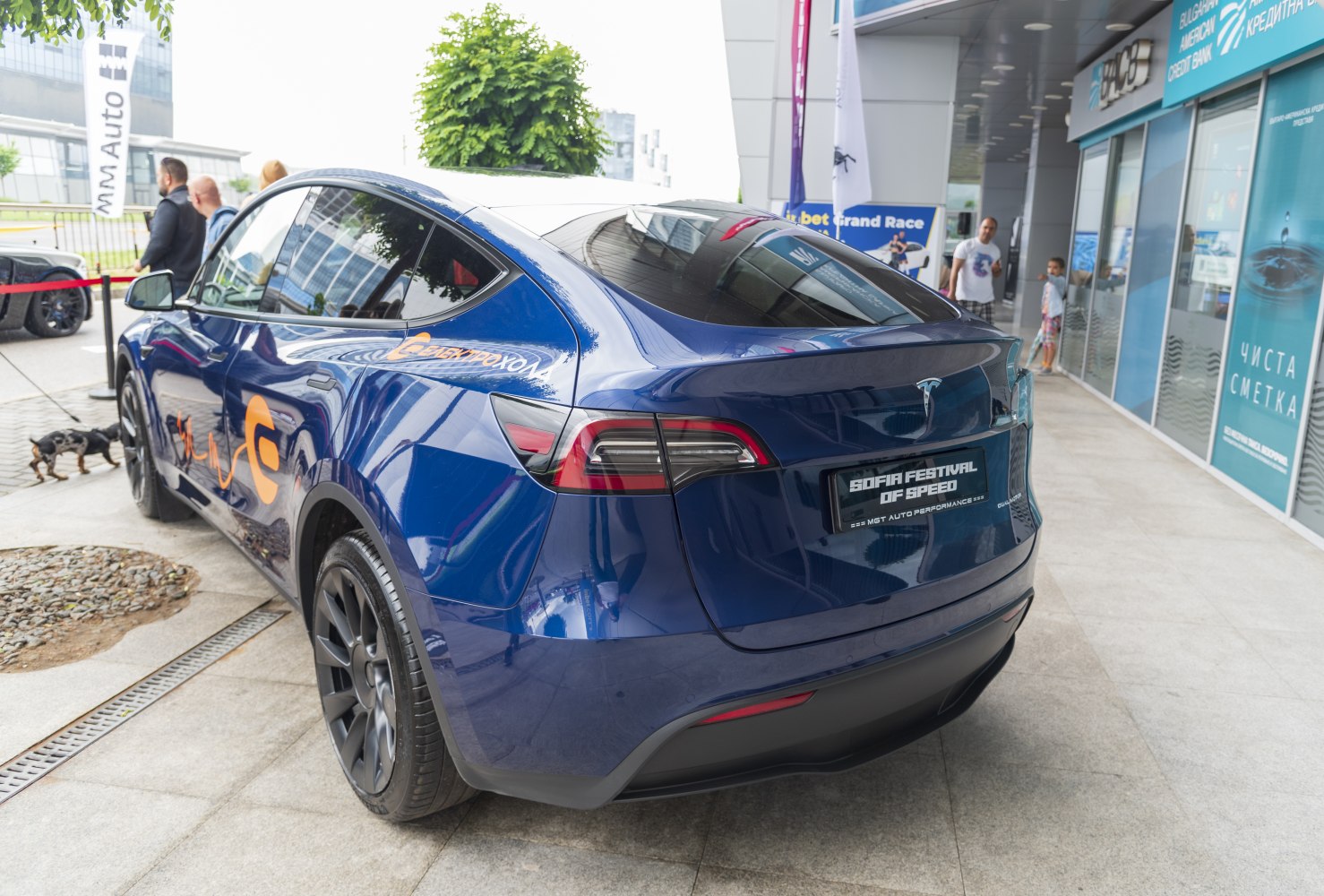 Rear view with modern LED tail lights and sporty black wheels