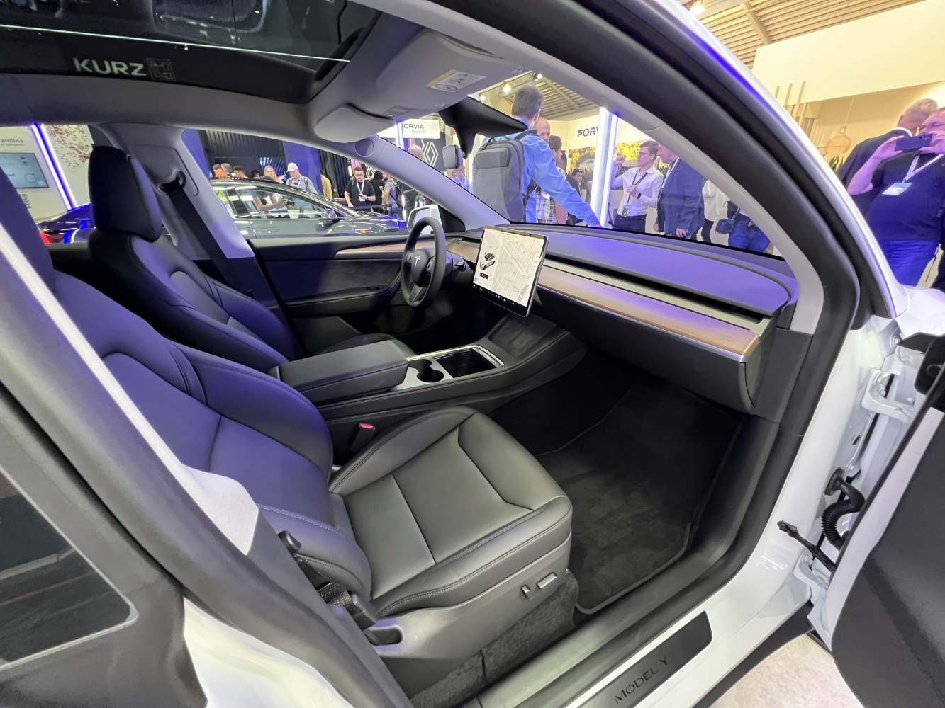 Minimalist interior with panoramic roof and central touchscreen