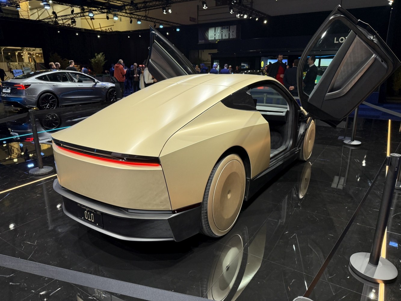 Futuristic rear design and gullwing doors of a concept EV