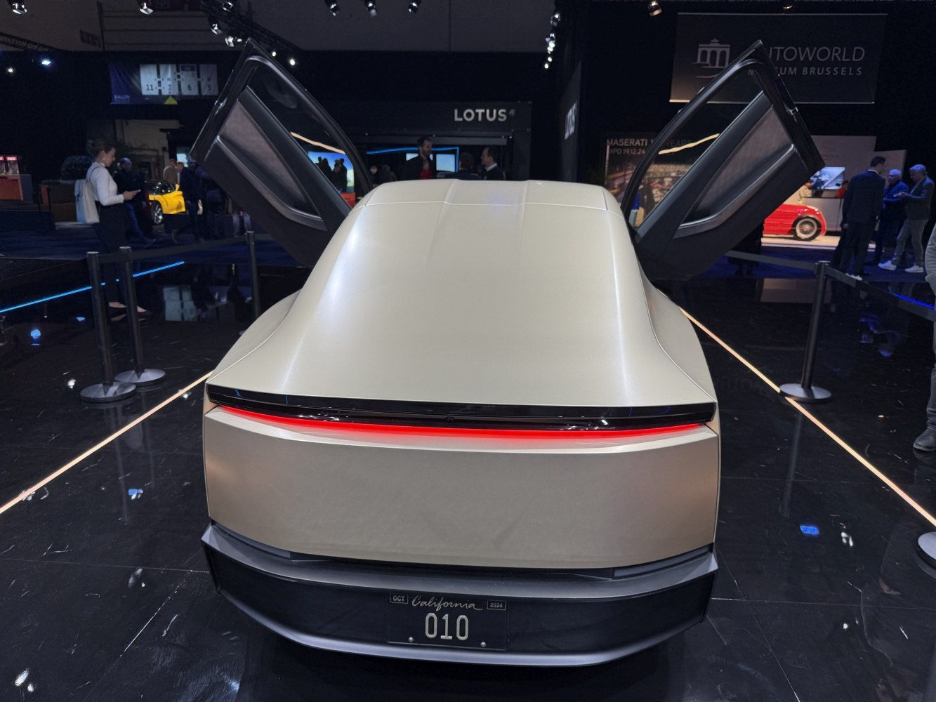 Rear light bar and falcon-wing doors on futuristic electric pickup