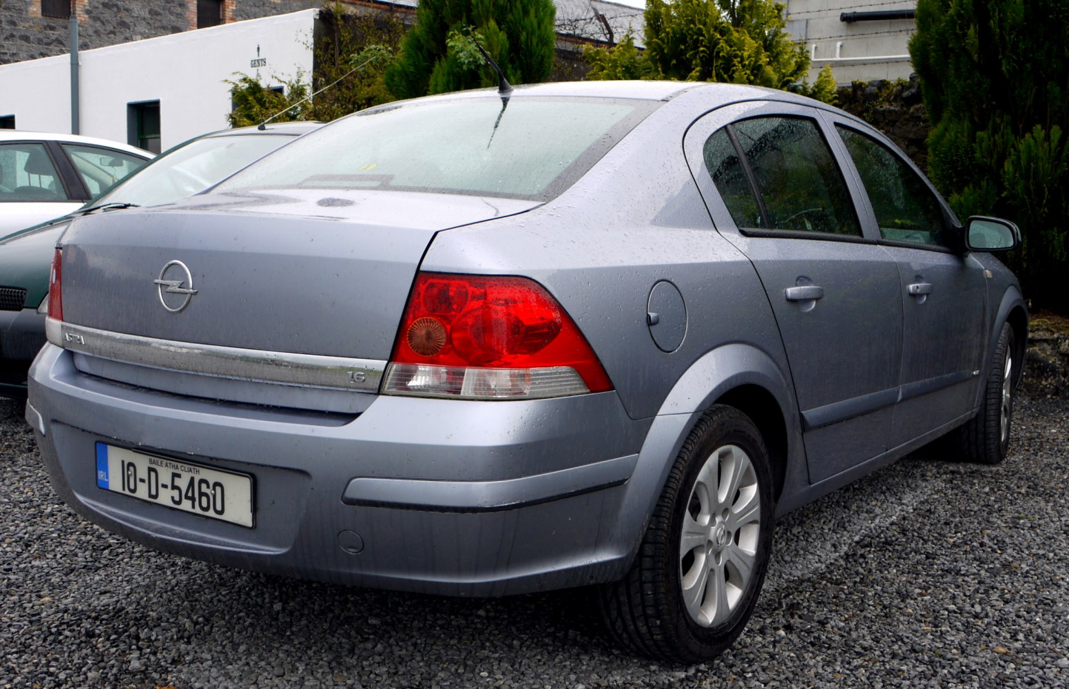 Rear view of a compact sedan with distinct tail lights and rear bumper