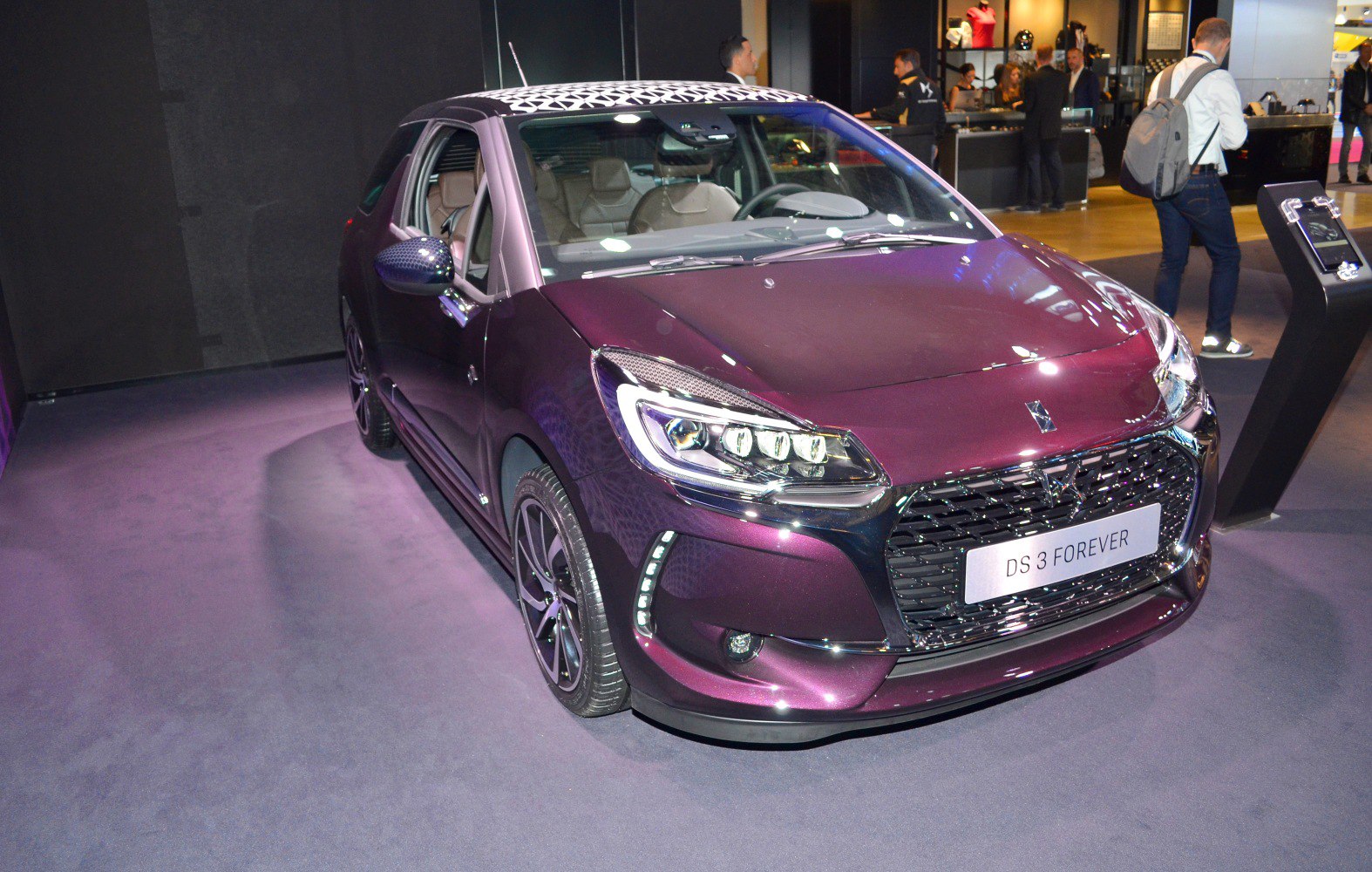 Front view of a hatchback with LED headlights and unique grille