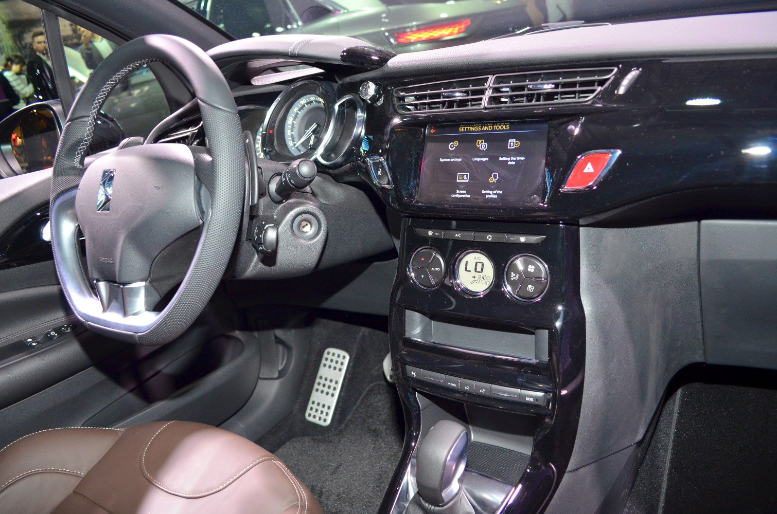 Interior with digital dashboard, steering wheel, and climate controls