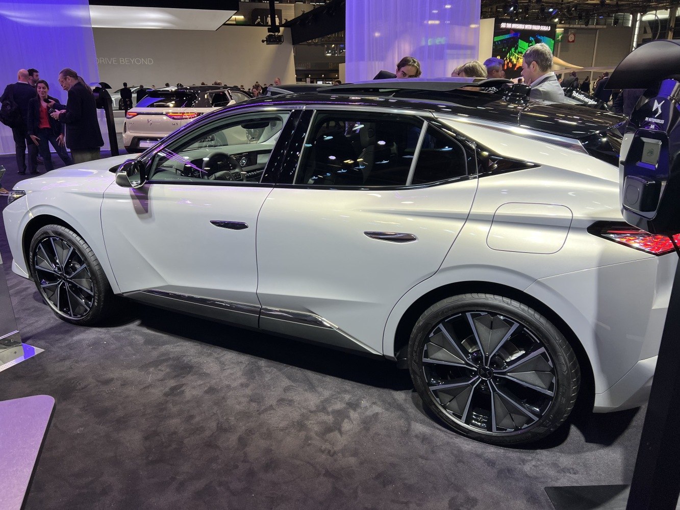 Sleek side profile with modern alloy wheels and flush door handles