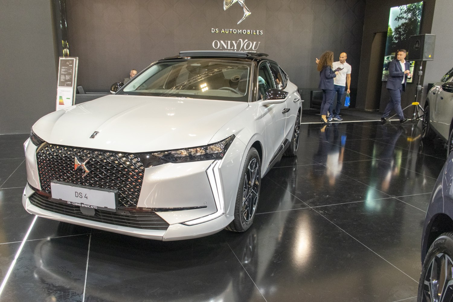 Front view featuring LED daytime running lights and diamond grille