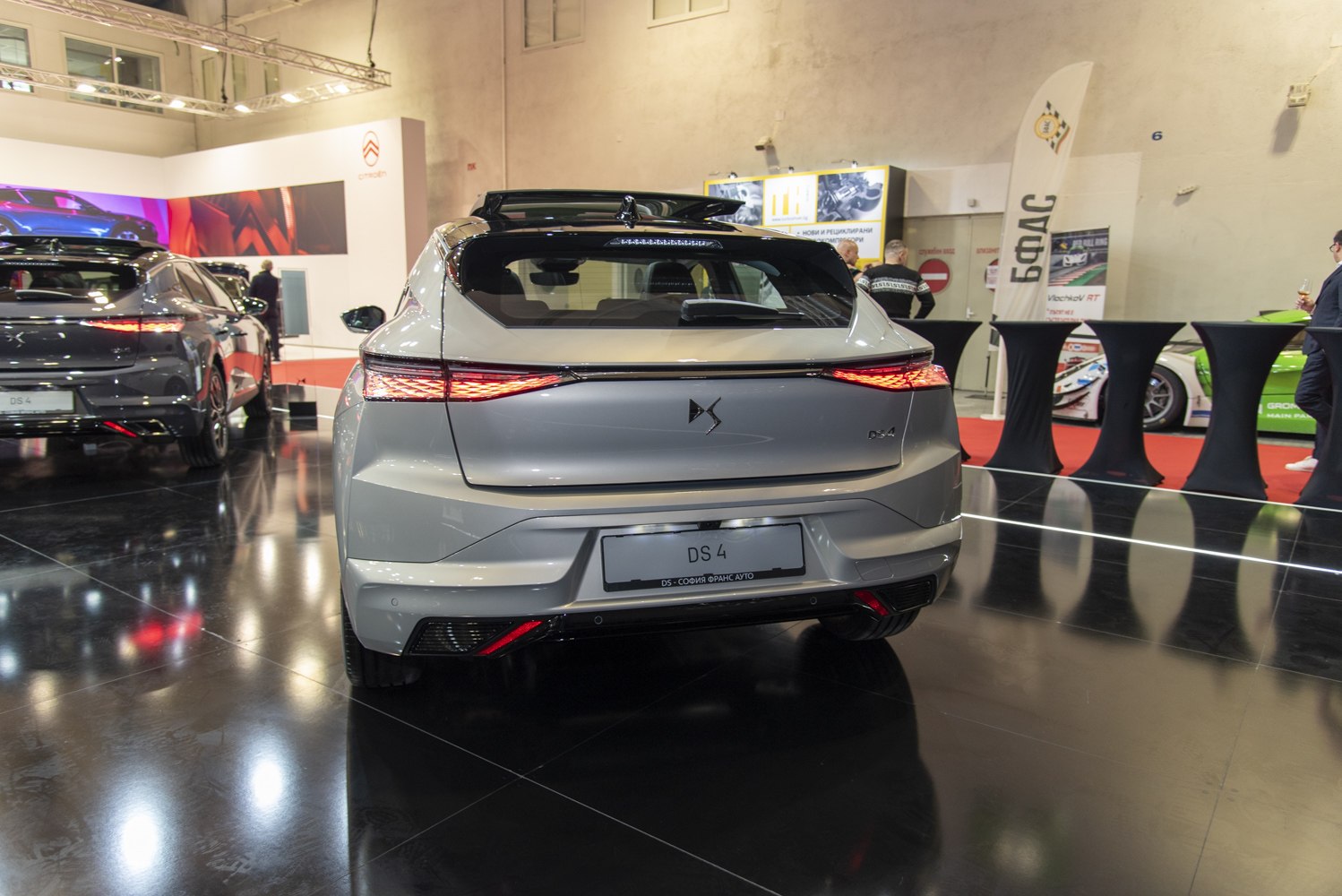 Rear view with sharp LED tail lights and aerodynamic hatchback design