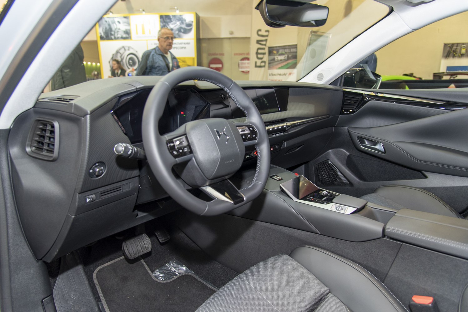Digital instrument cluster and multifunction steering wheel in a modern car interior