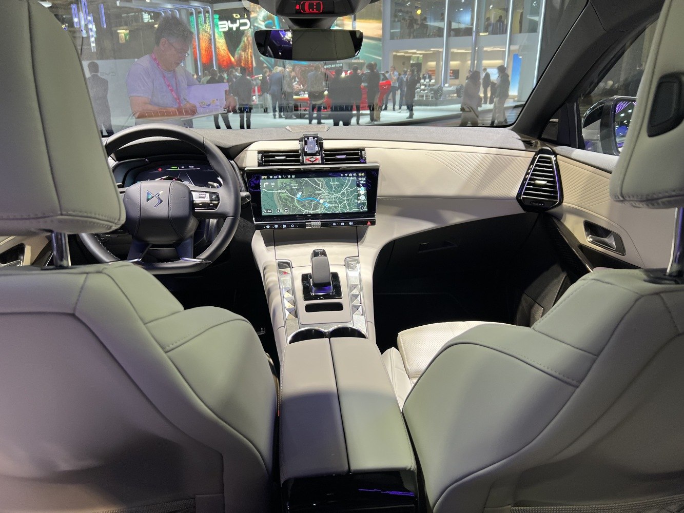 Luxurious car interior with digital dashboard, touchscreen, and premium seats