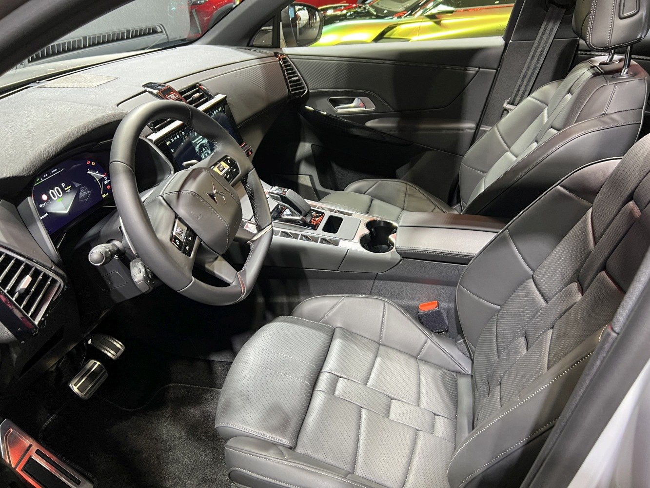Luxury leather seats and digital dashboard with modern steering wheel