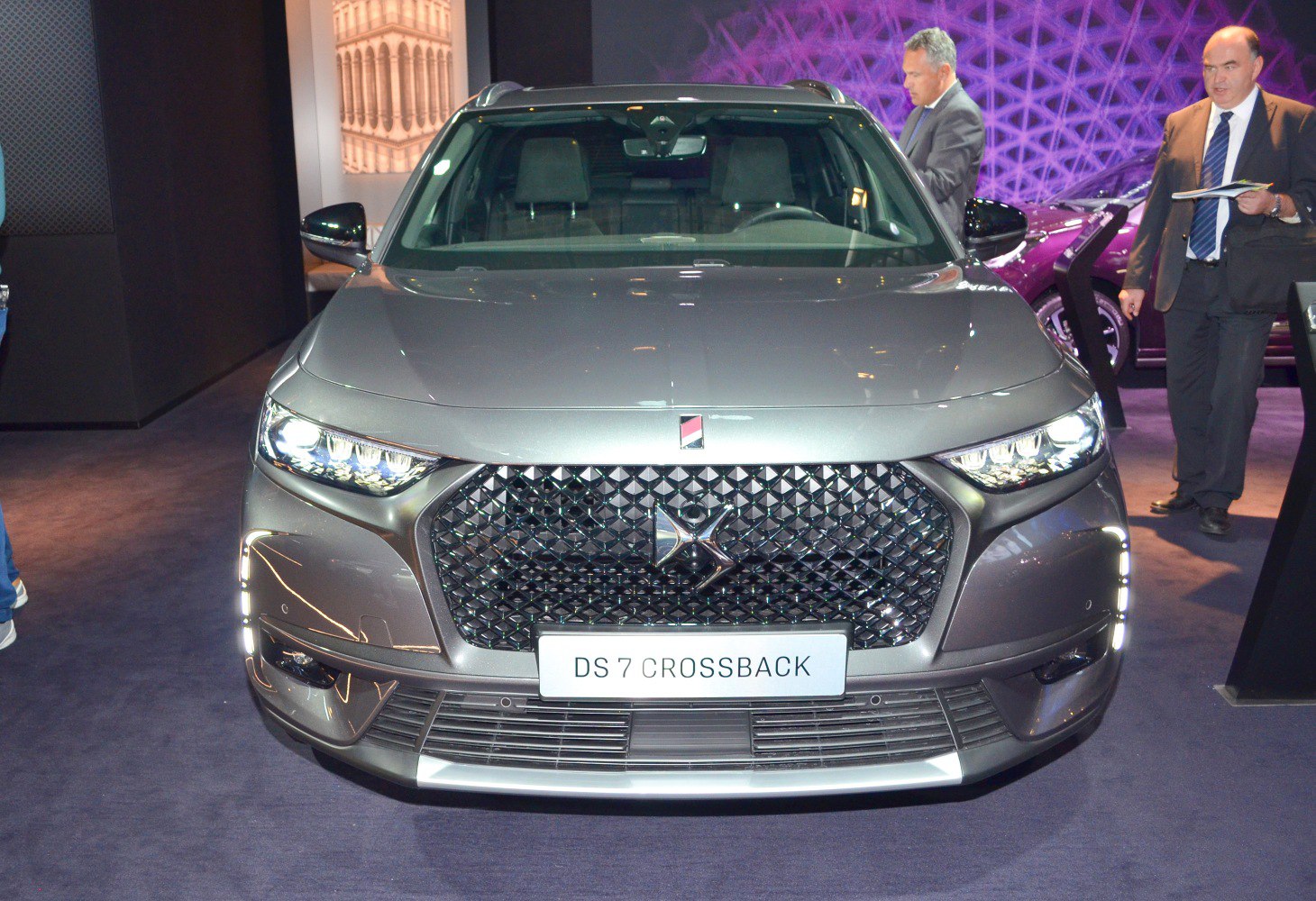 Front view with prominent grille and LED headlights