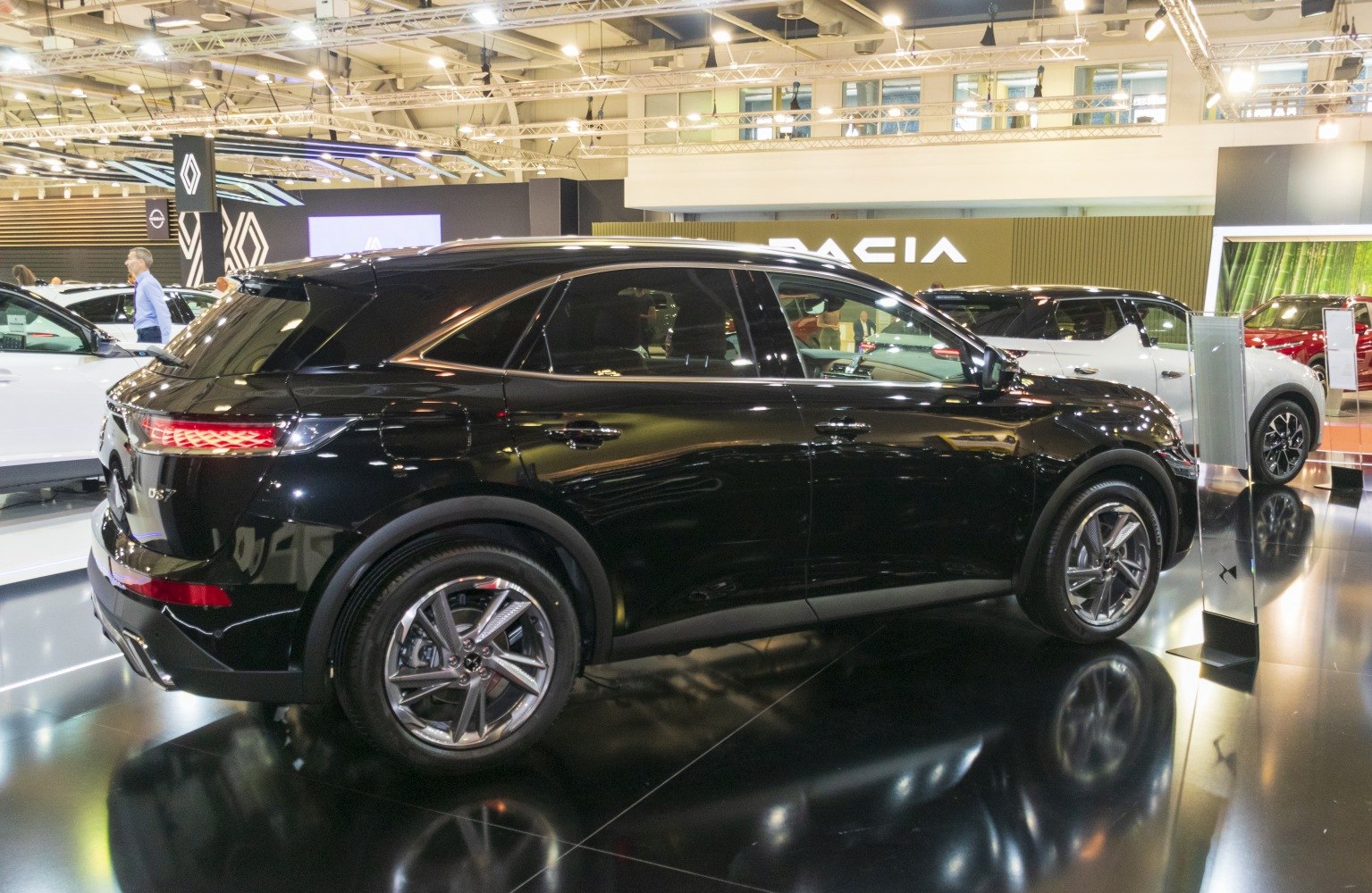 Black SUV rear side view with sharp taillights and alloy wheels