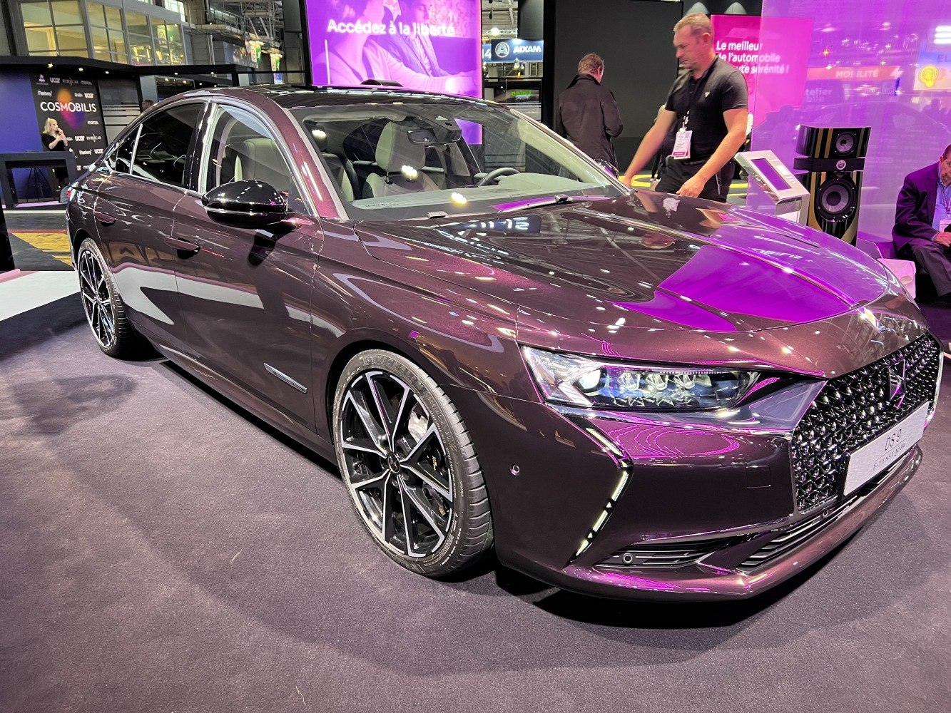 Luxury sedan with multi-spoke alloy wheels and LED headlights