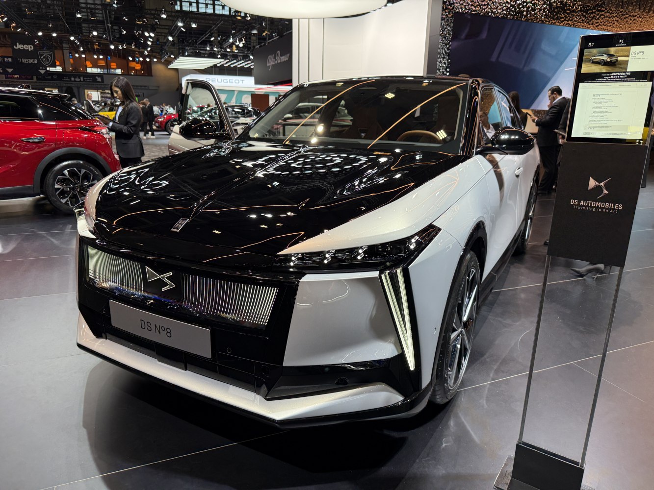 Front view showing bold grille and vertical LED lights