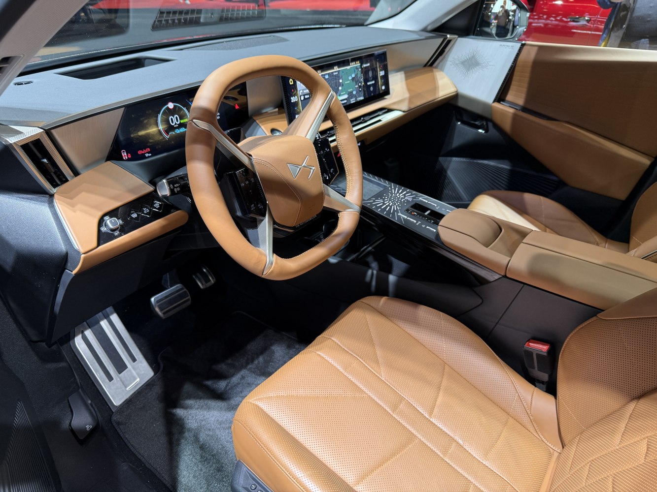 Digital dashboard and touchscreen center console with luxury tan leather seats