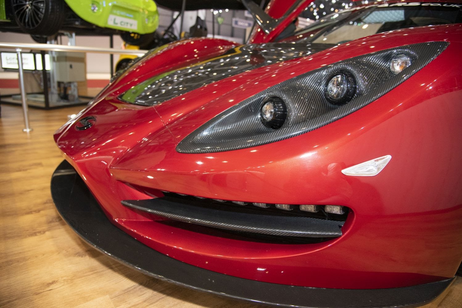 Aerodynamic front end with carbon fiber multi-lamp headlights