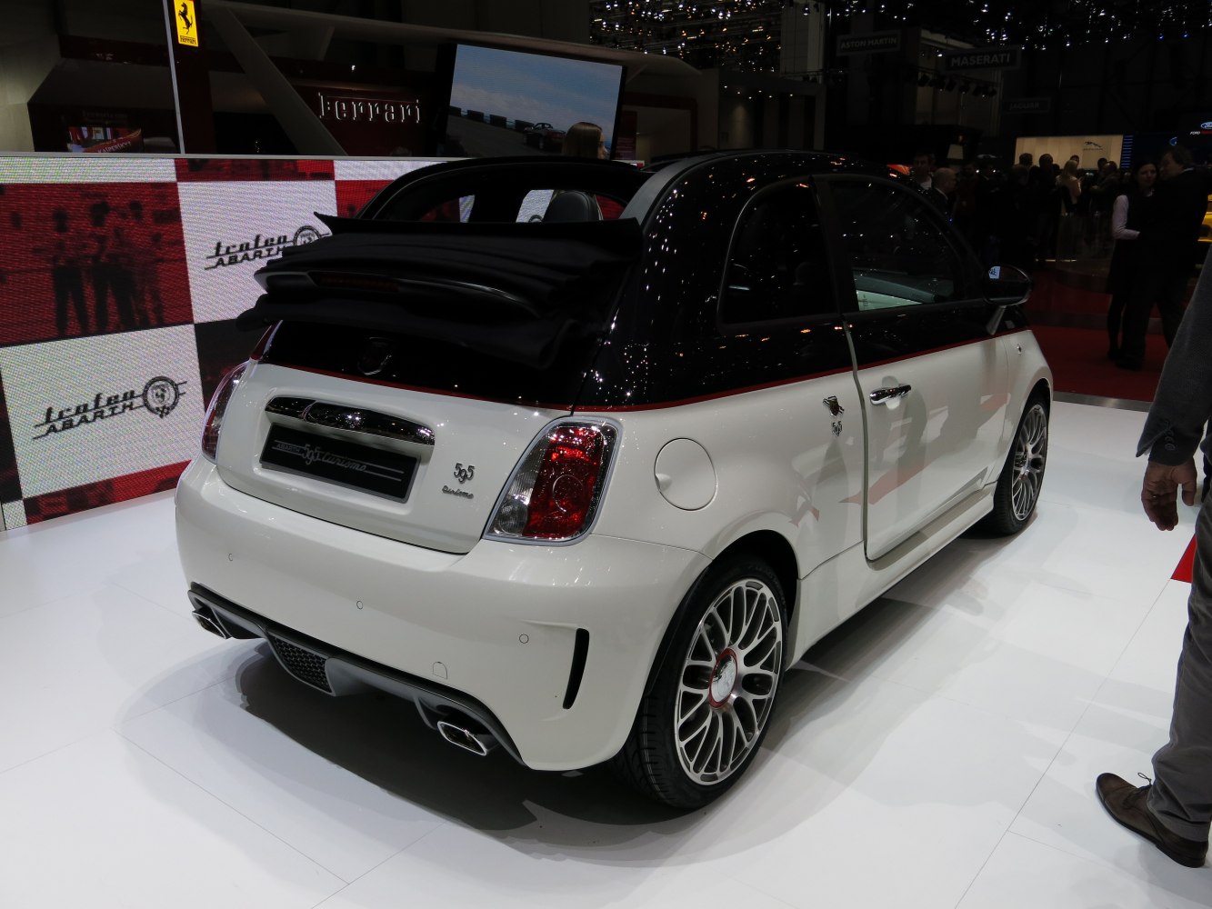 Retractable soft top roof and rear view of compact sporty hatchback