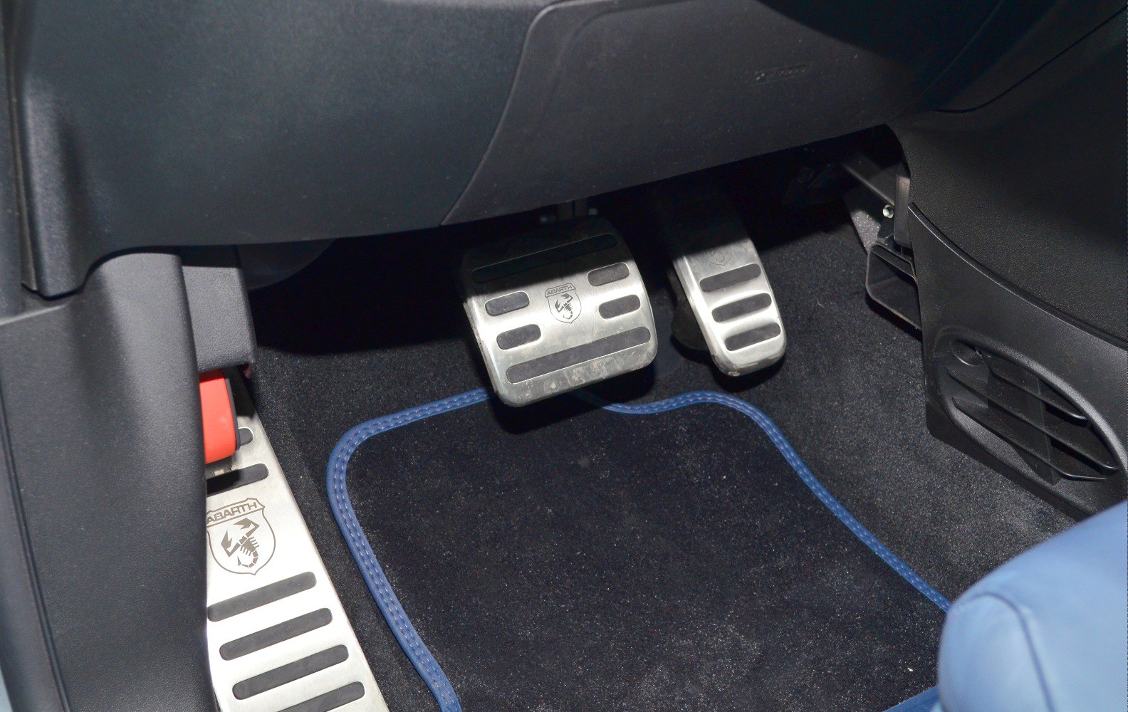 Aluminum alloy pedals with Abarth logo in car footwell