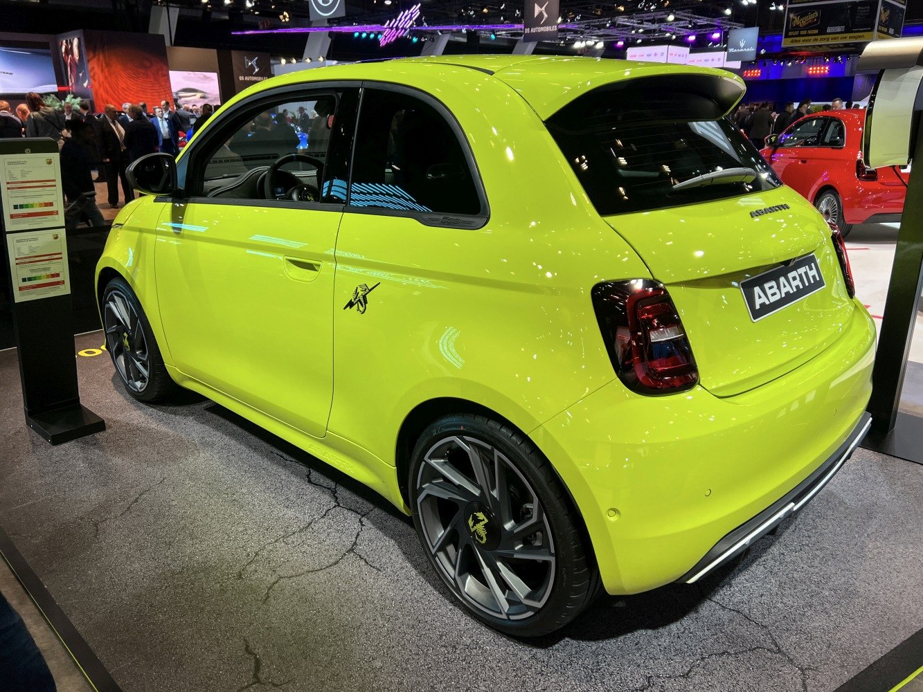Rear side view of sporty hatchback with alloy wheels and rear spoiler