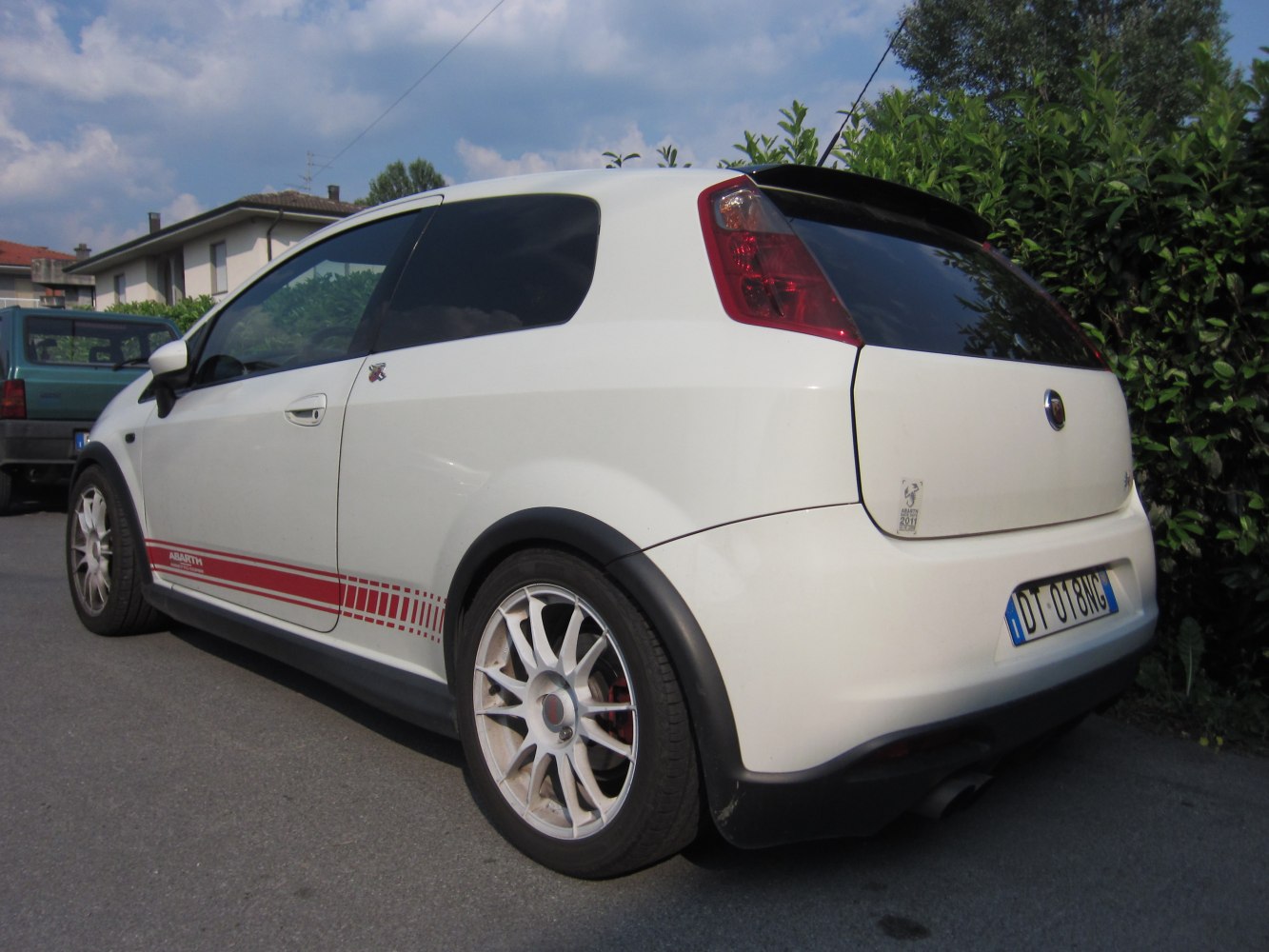 Rear side view with racing wheels and red side stripes