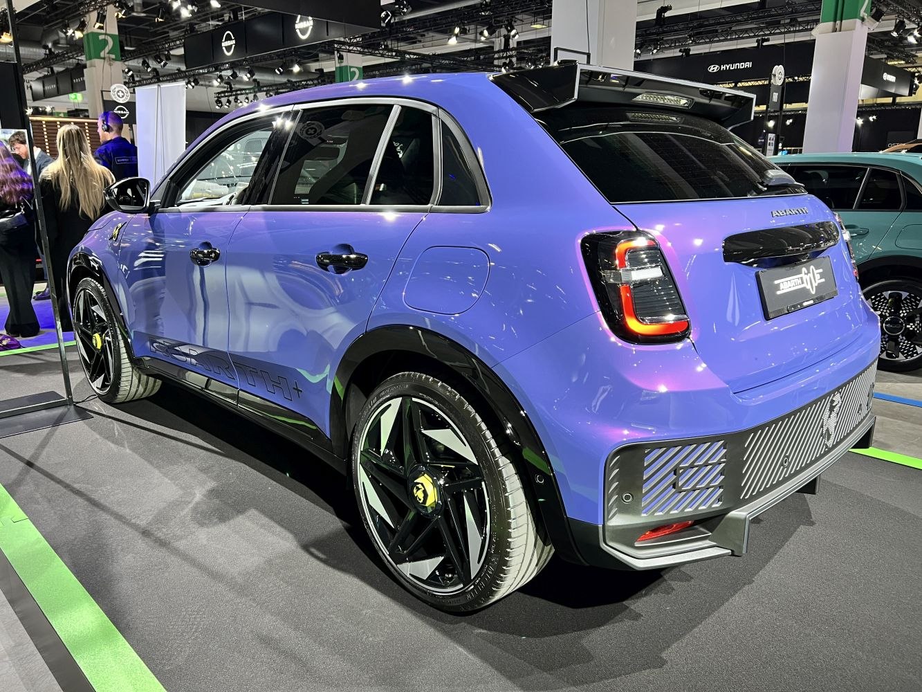 Electric compact SUV rear and side profile with rear lights and alloy wheels