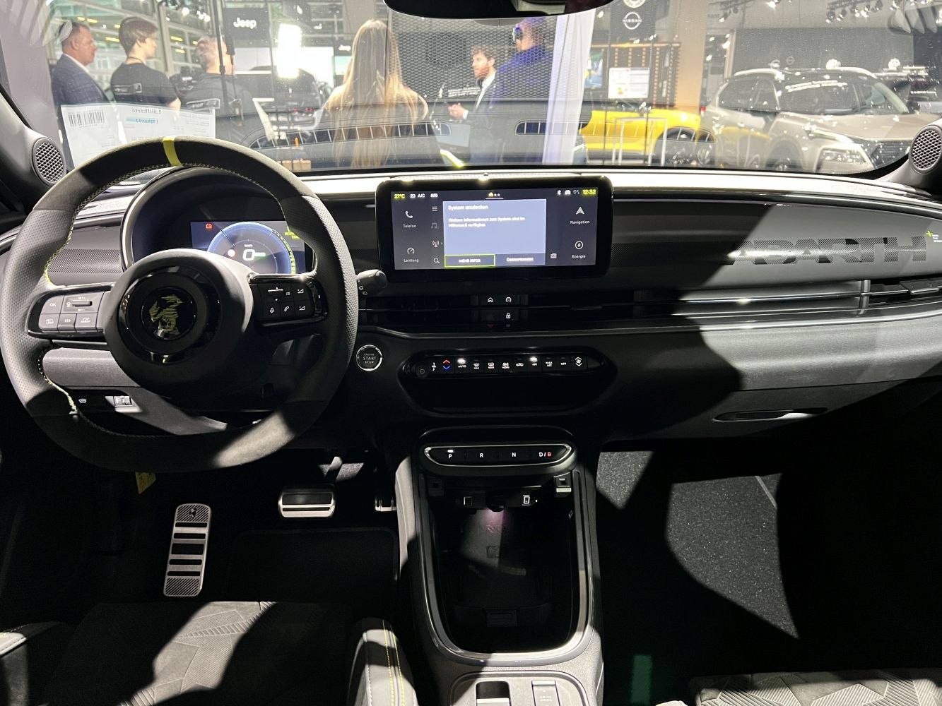 Electric car interior with digital instrument cluster and touchscreen infotainment