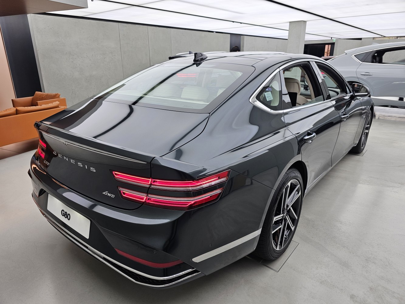 Sleek rear design with distinctive LED tail lights and 4WD badging.