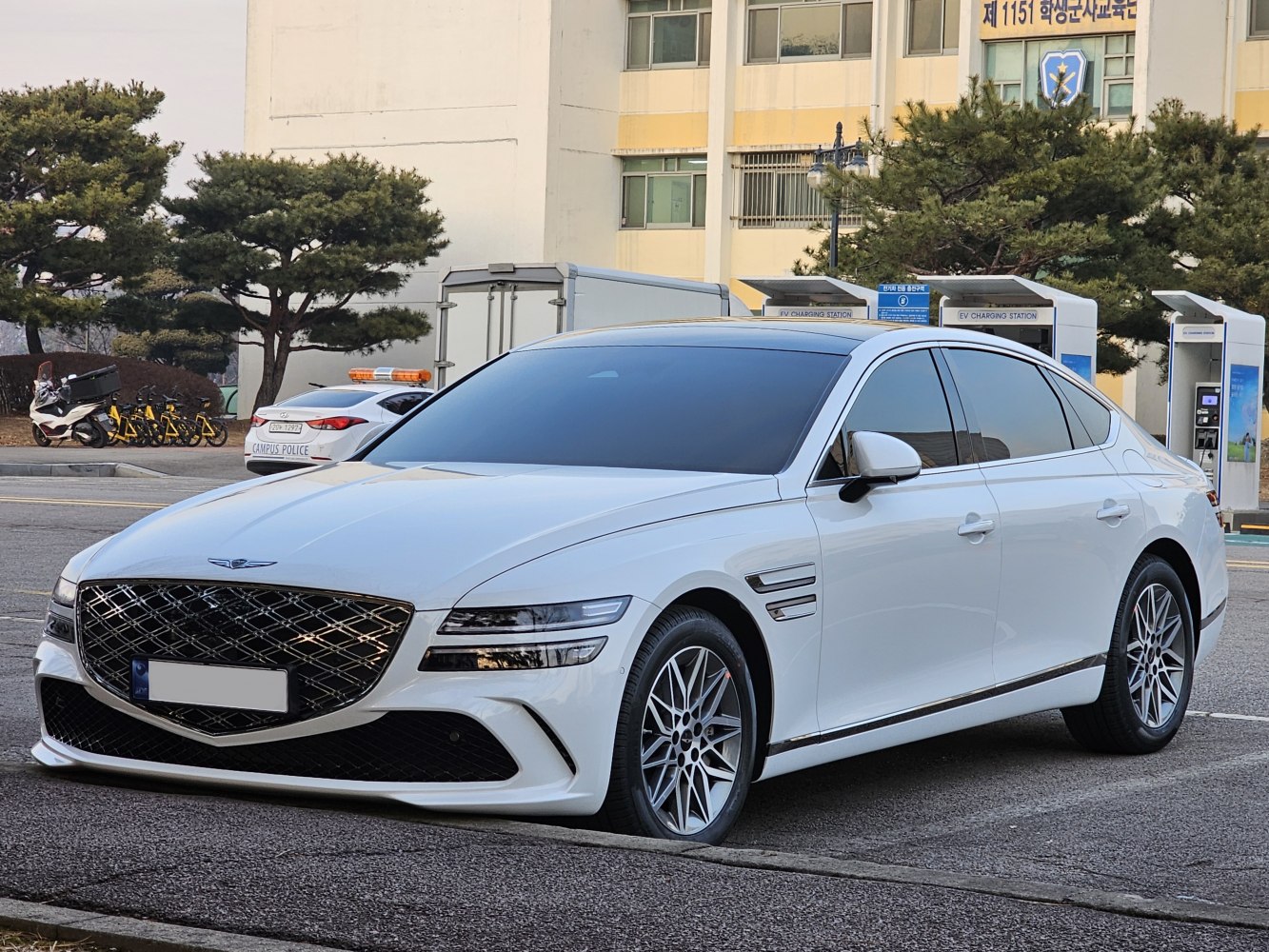 Front and side view with distinctive grille and sleek design