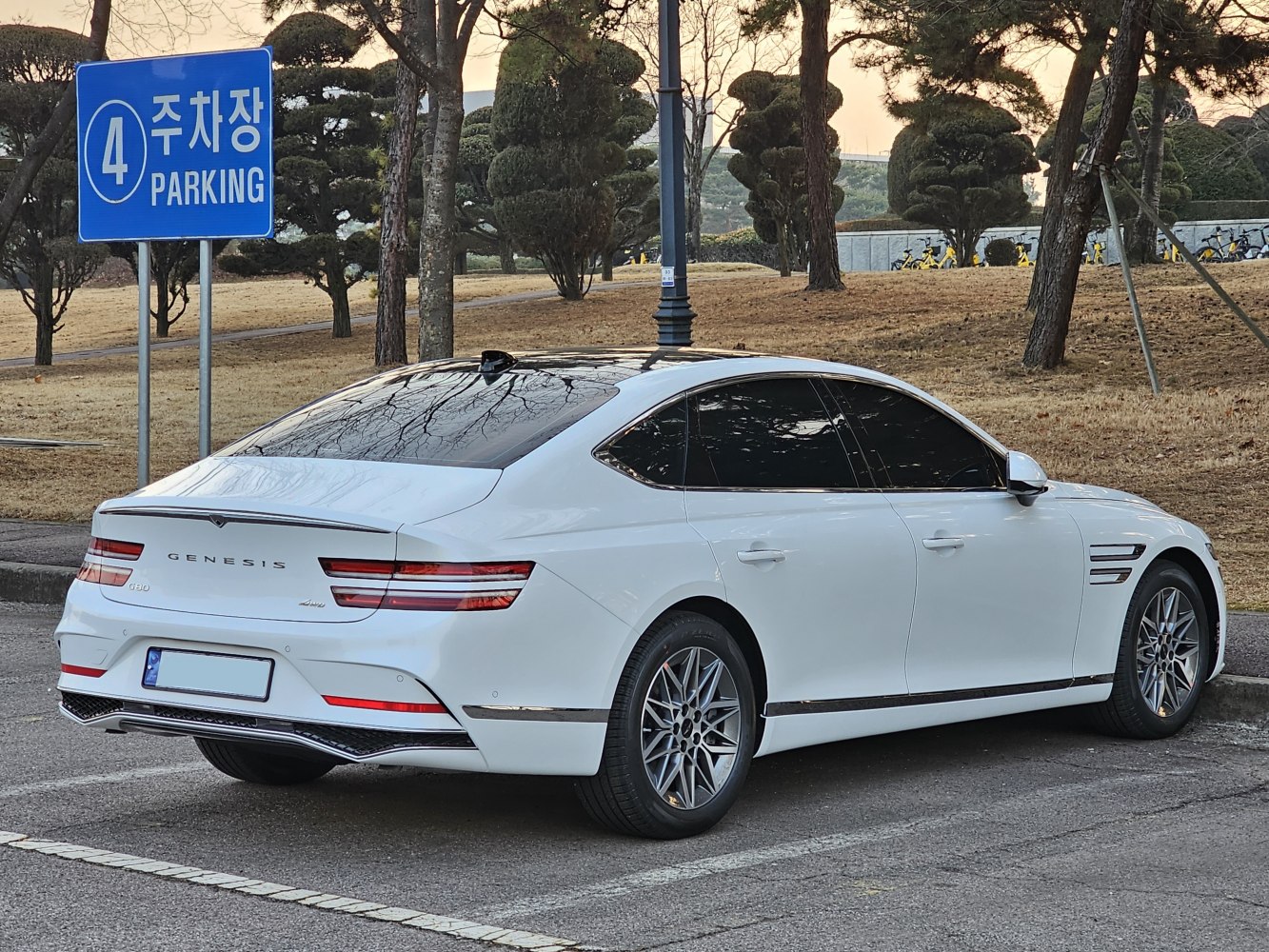 Rear and side profile view with modern taillights and alloy wheels
