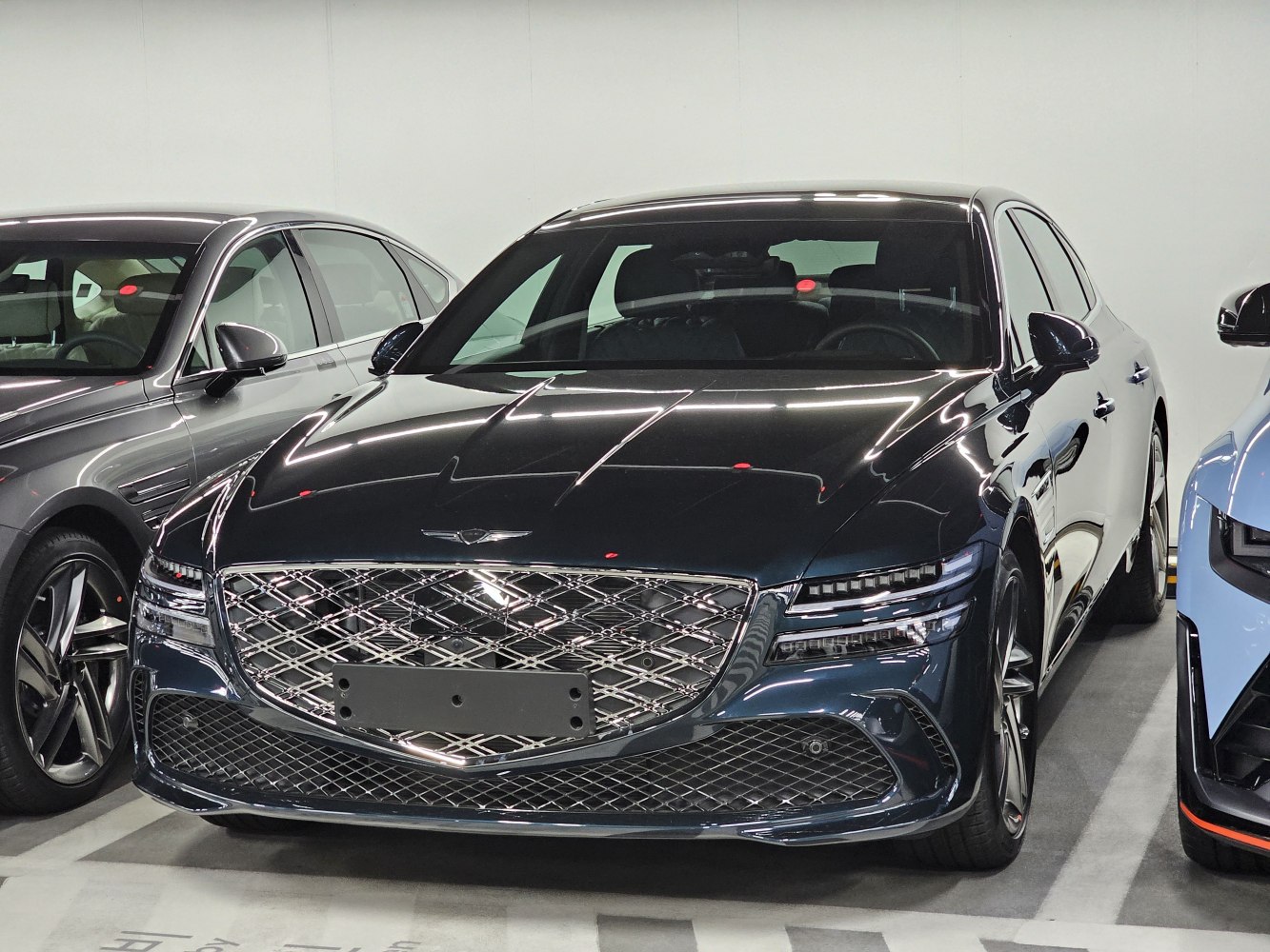 Luxury car front grille and LED headlights in detailed view