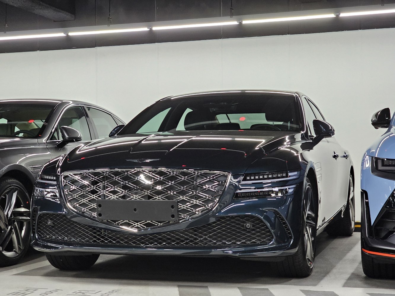 Luxurious front grille and LED headlights on a modern luxury sedan
