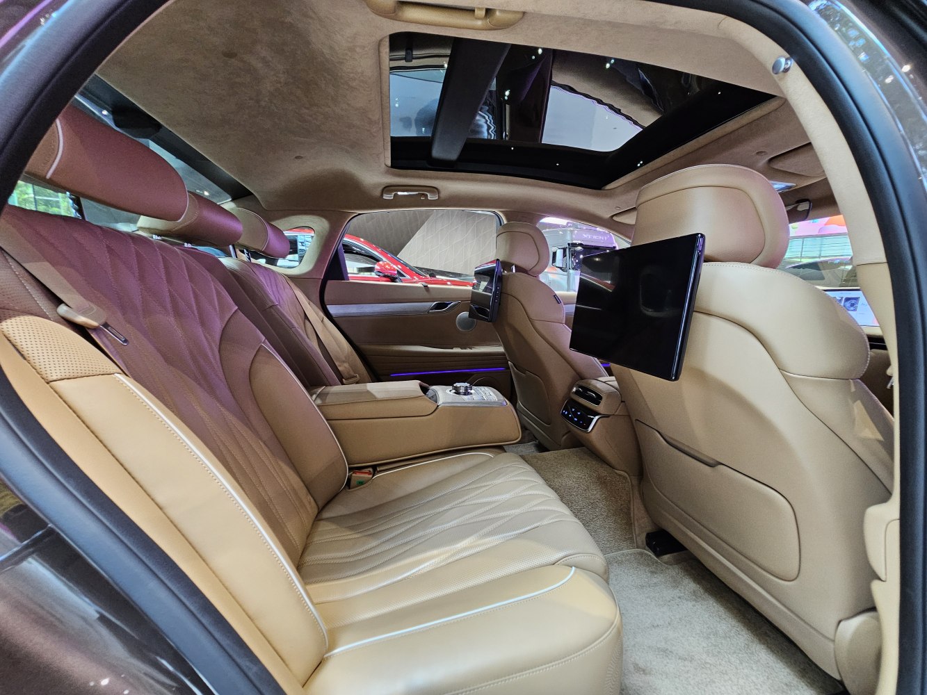 Leather rear seats with dual entertainment screens and panoramic sunroof