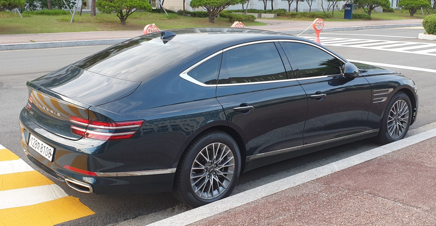 Rear side with LED tail lights and multi-spoke alloy wheels