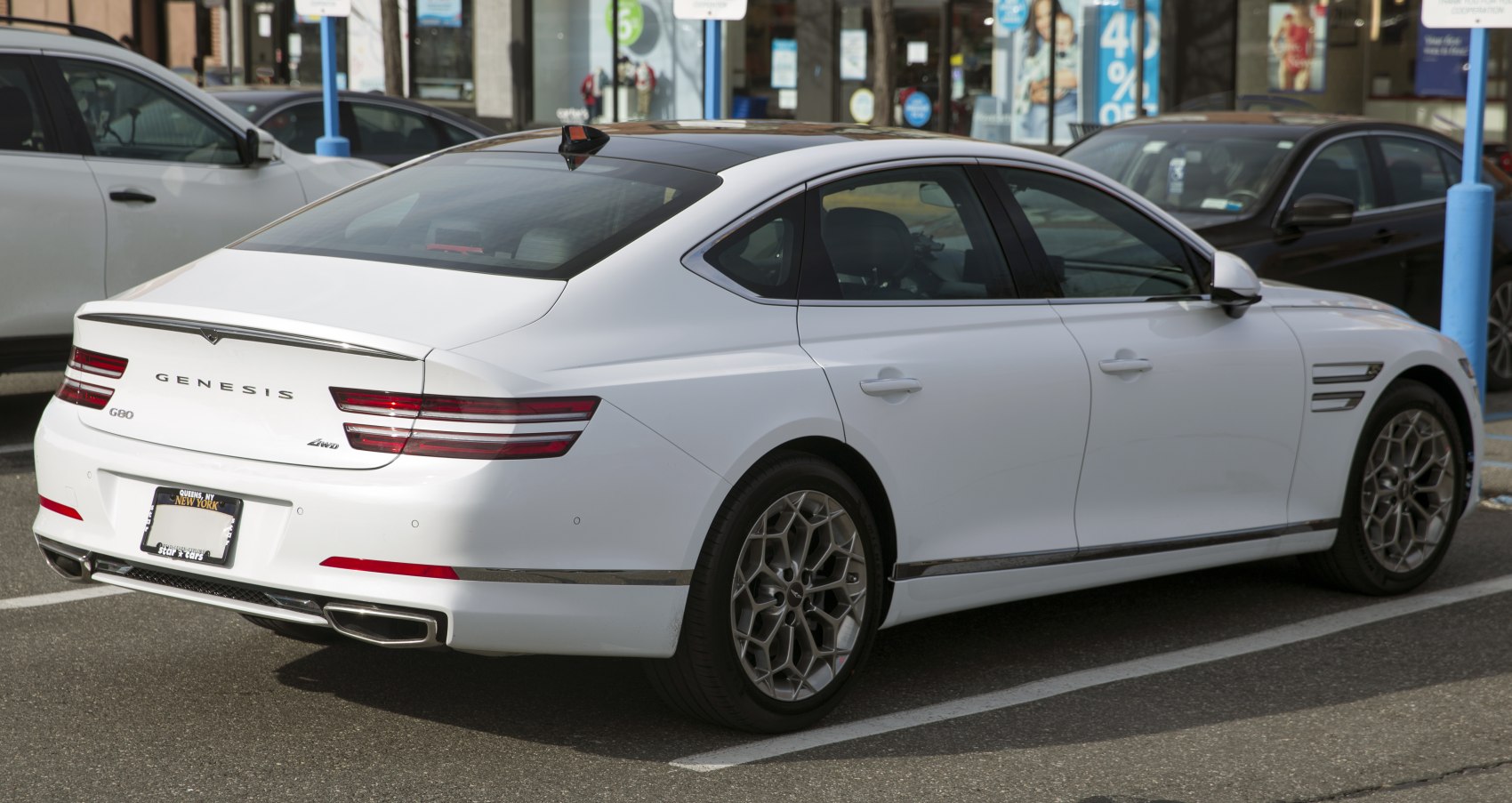 Rear and side profile with distinct taillights and alloy wheels