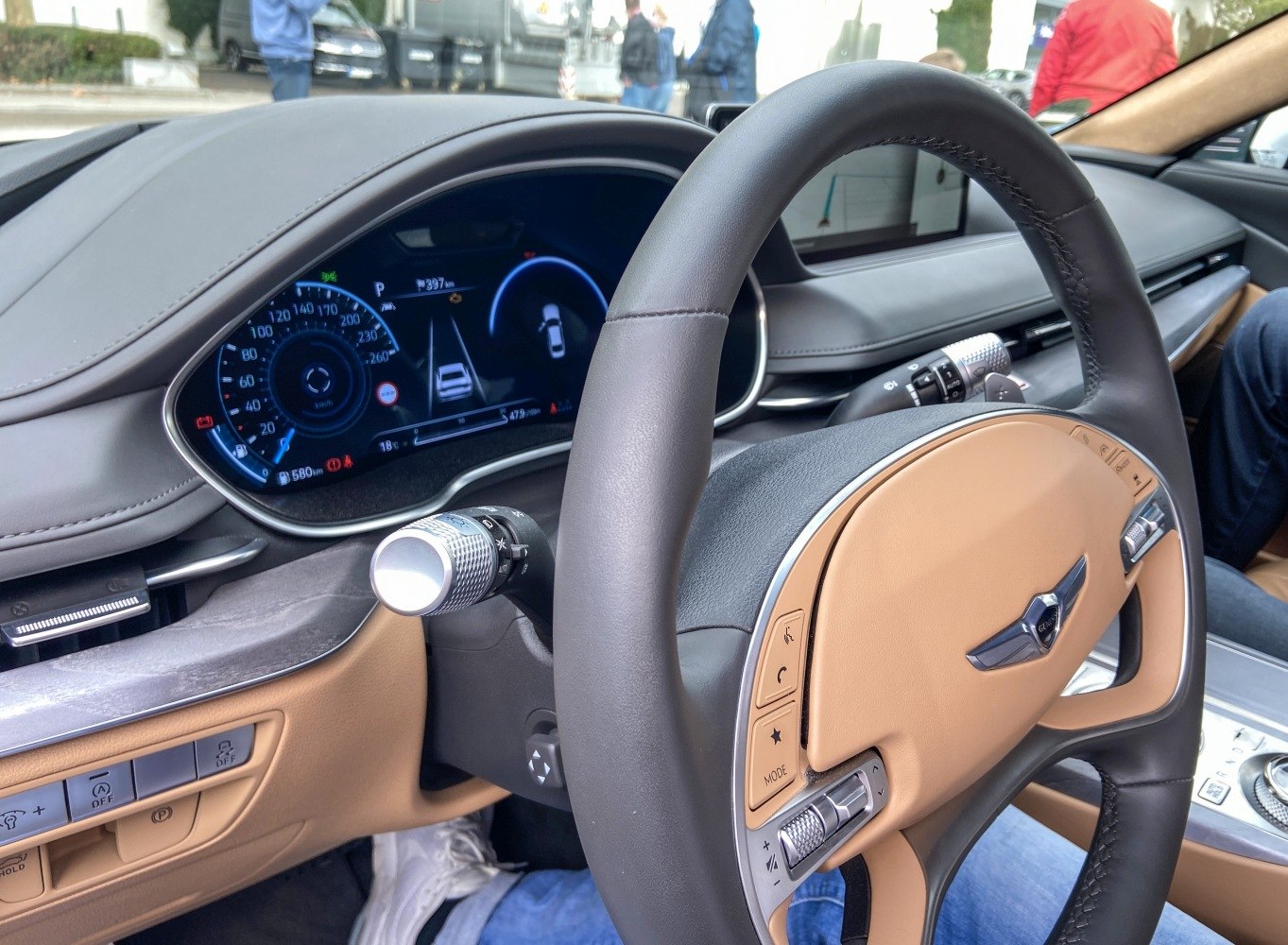 Digital instrument cluster and premium leather steering wheel close-up