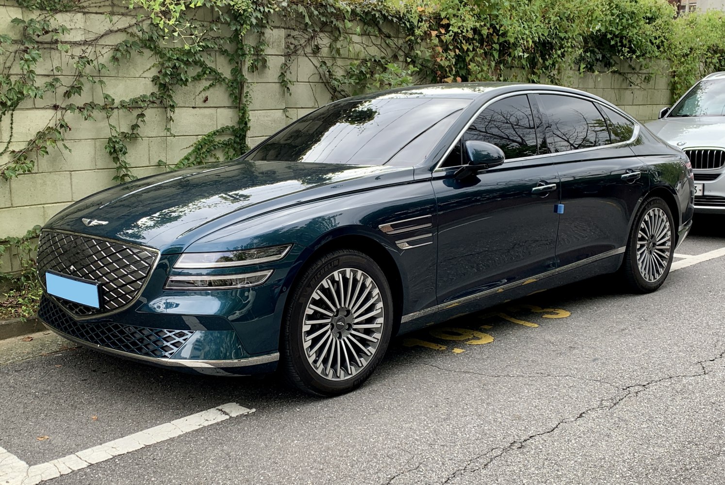 Luxury sedan with distinctive front grille and sleek aerodynamic profile