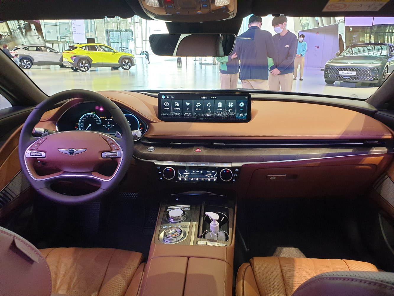 Luxury tan leather interior with digital dashboard and advanced infotainment system