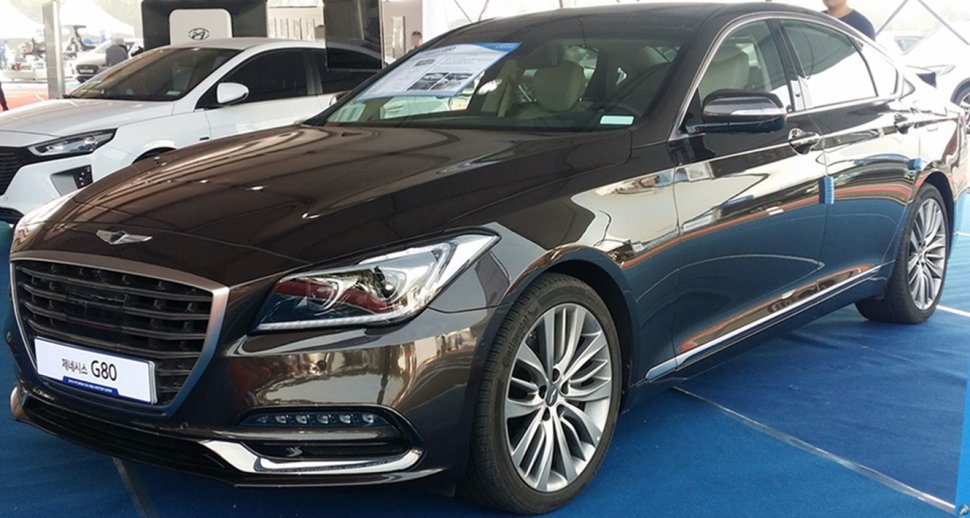 Front grille and LED headlights of luxury sedan