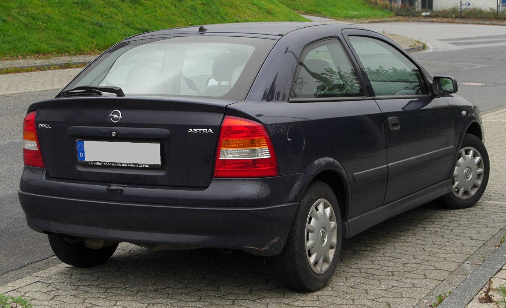 Rear view of a hatchback with distinct tail lights and rear design