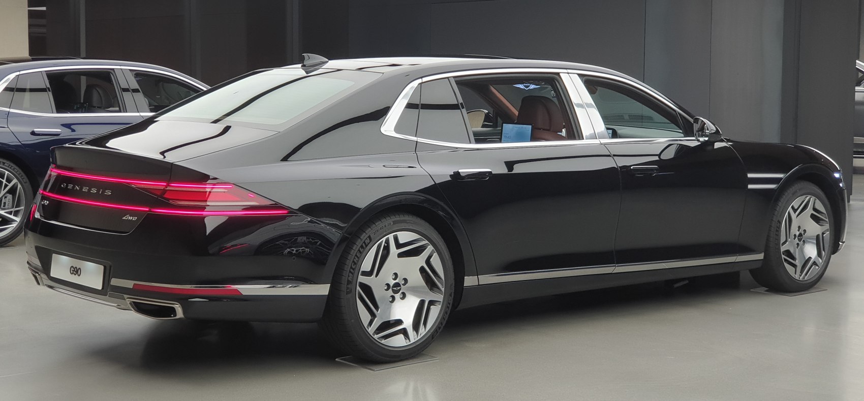 Rear side profile with LED taillights and modern alloy wheels.