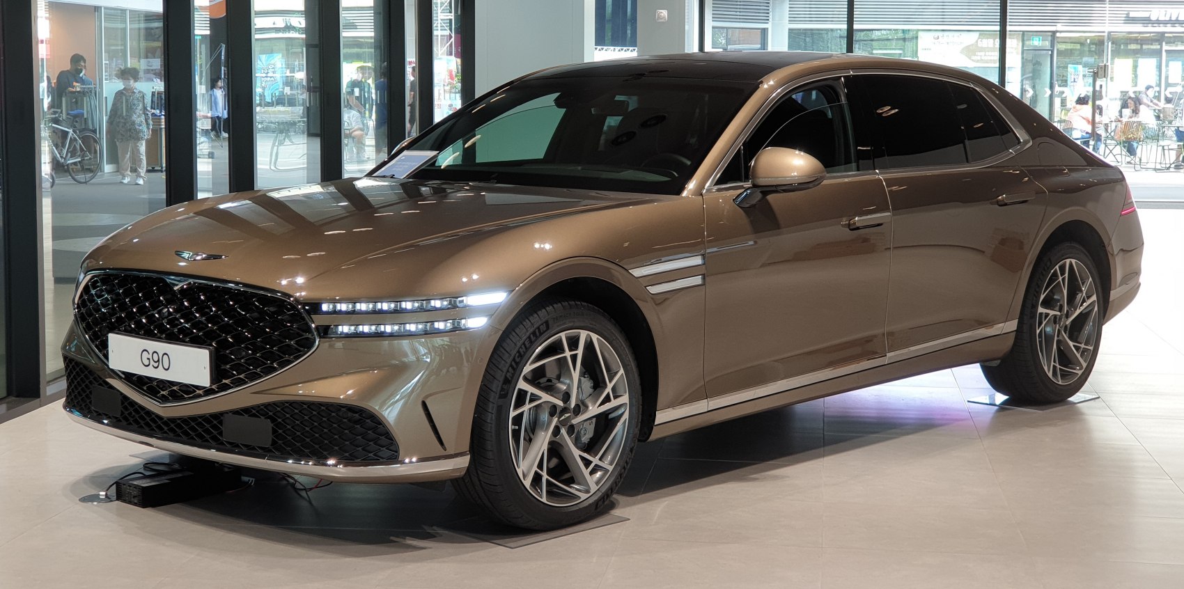Luxury sedan with split LED headlights and aerodynamic design