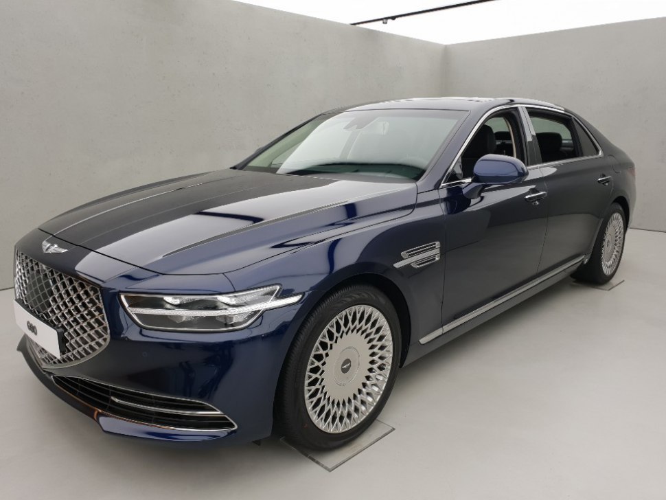 Luxury sedan front and side view with distinctive grille and alloy wheels