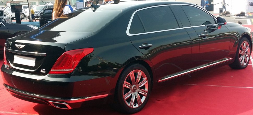 Luxury sedan rear view with extended wheelbase and chrome trim