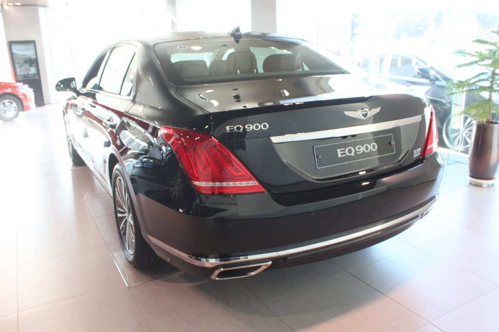 Rear view showing distinct tail lights and exhaust trim.