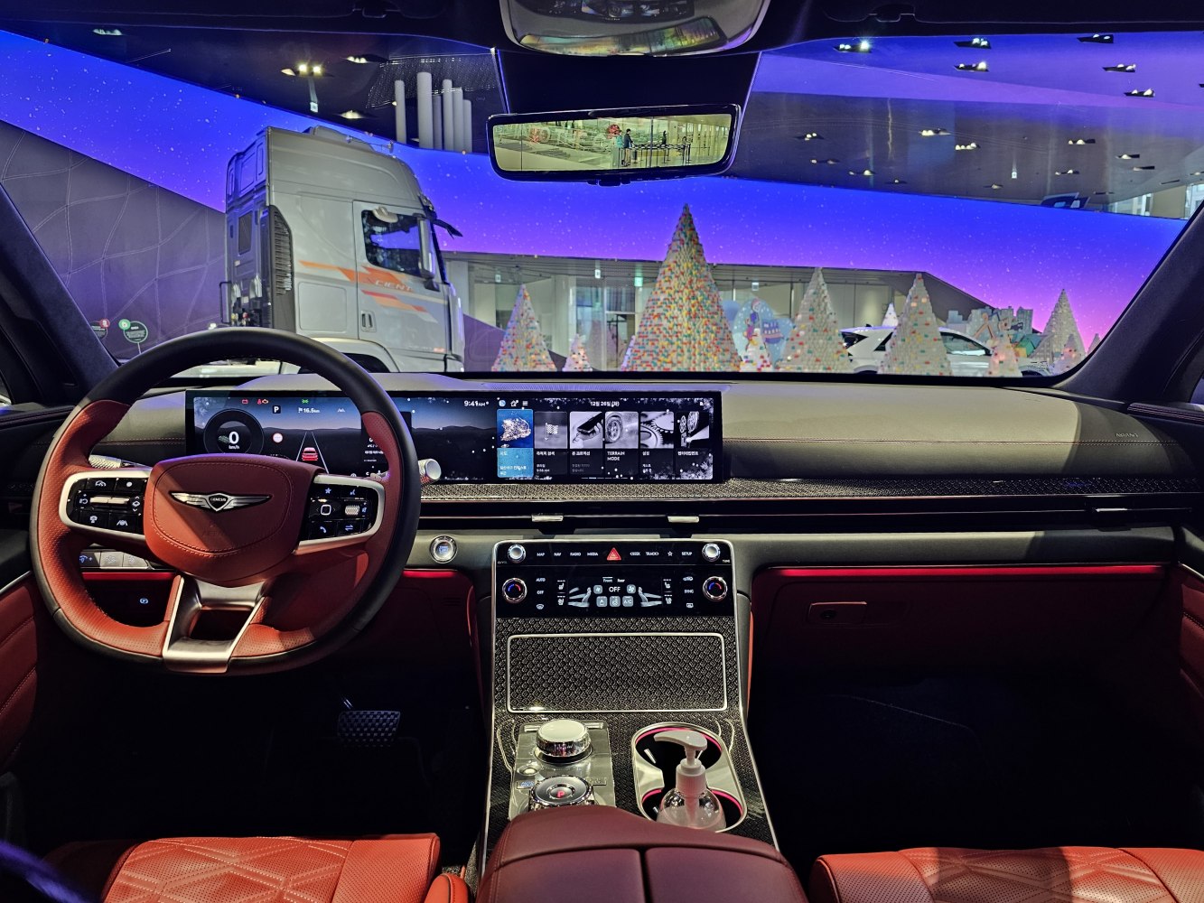 Digital dashboard and premium steering wheel with red leather upholstery