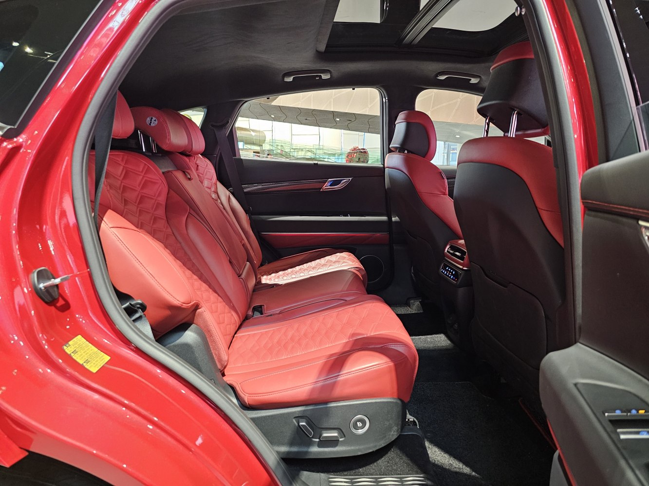 Red quilted leather rear seats with luxury cabin features