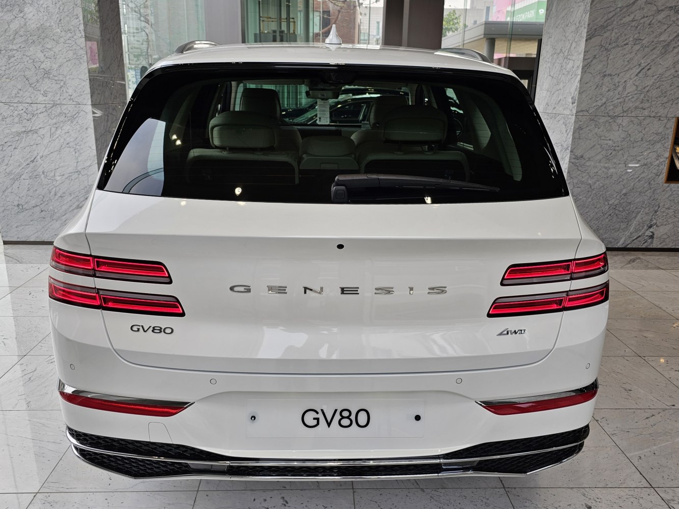 Rear view with slim LED tail lights and 4WD badge