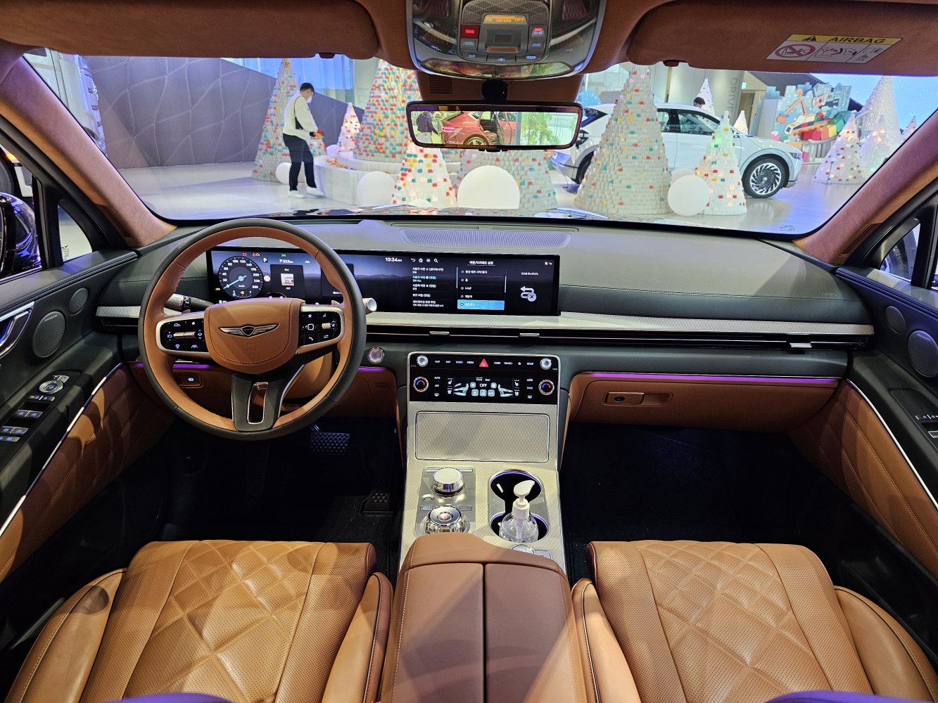 Luxury brown leather interior with digital dashboard and modern console