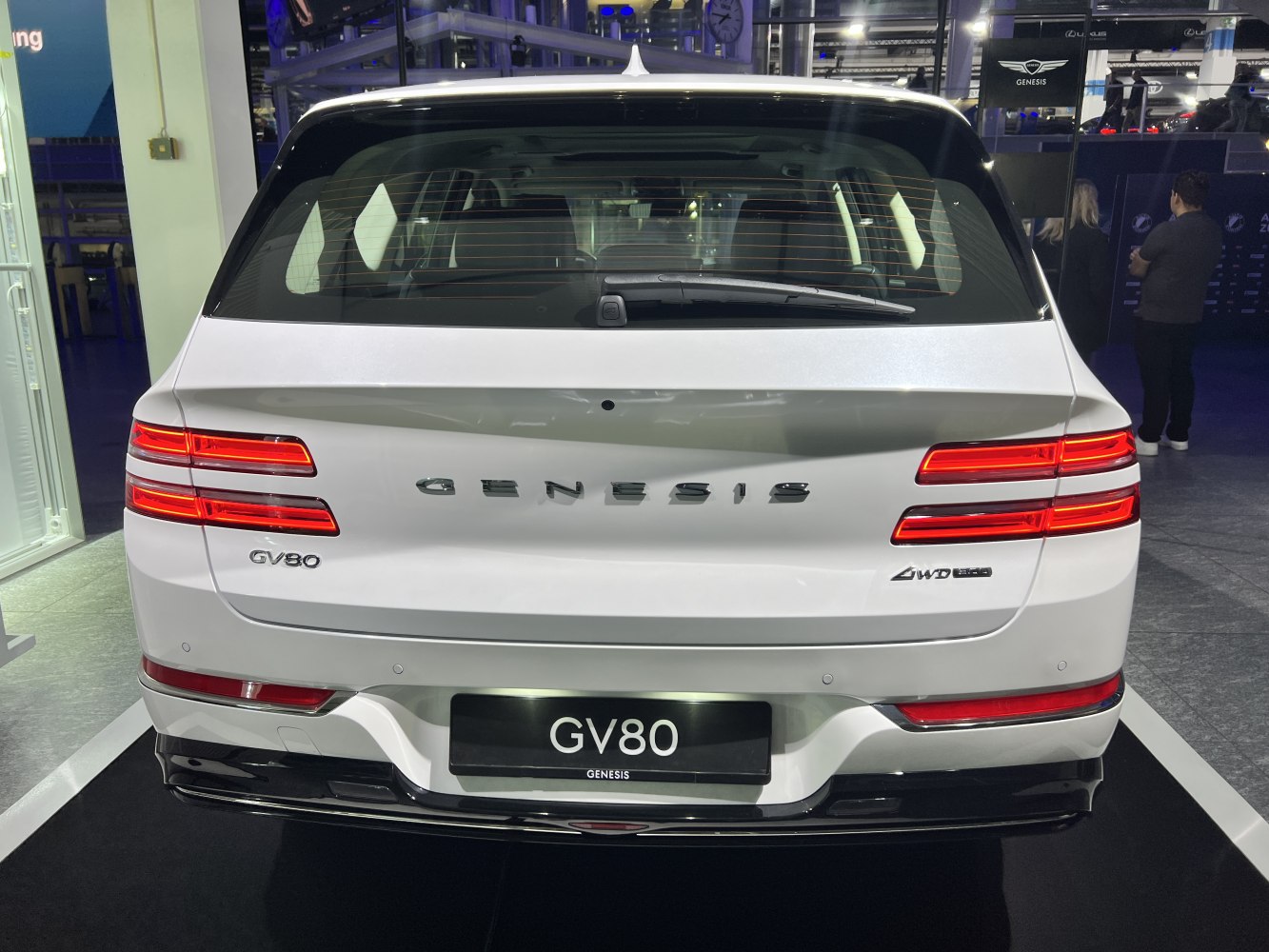 Rear view with LED tail lights and AWD badge.